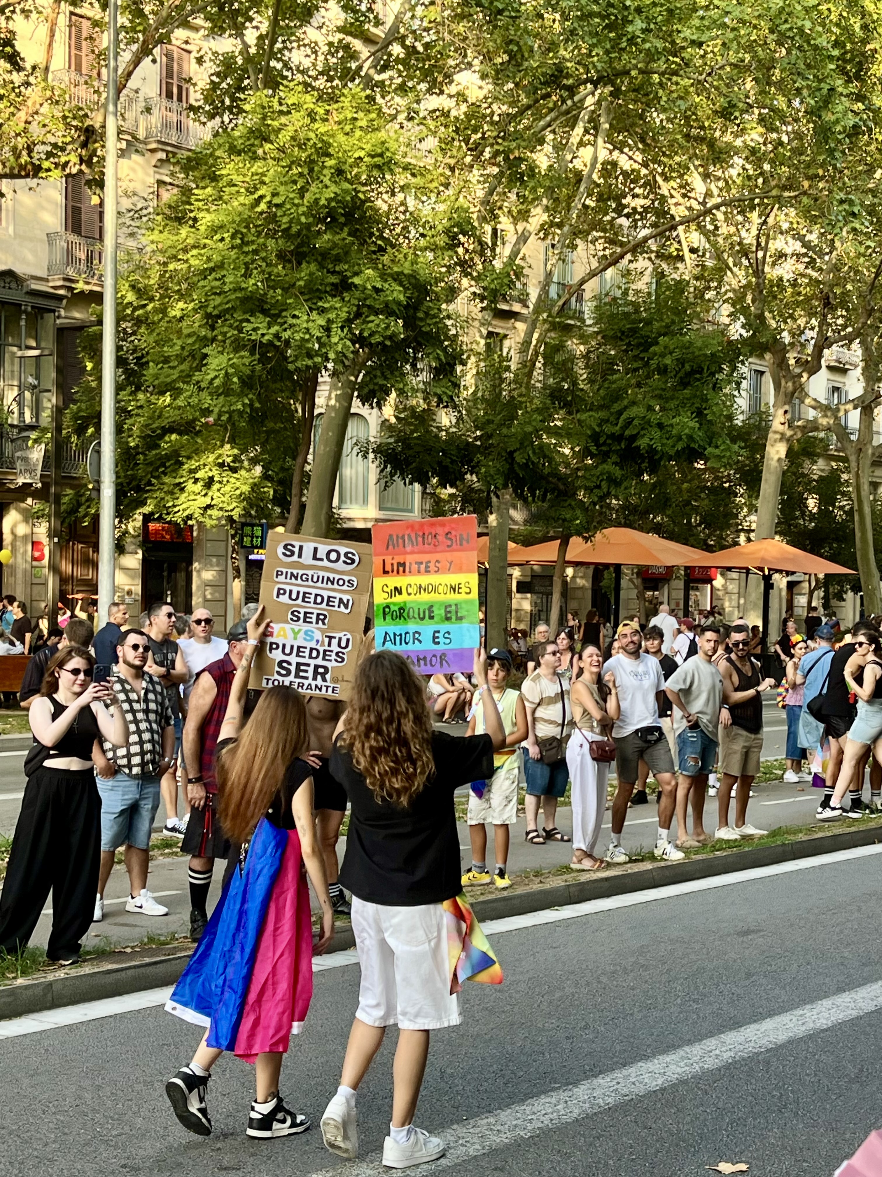 A sign about tolerance featuring penguins at Barcelona Pride 2025