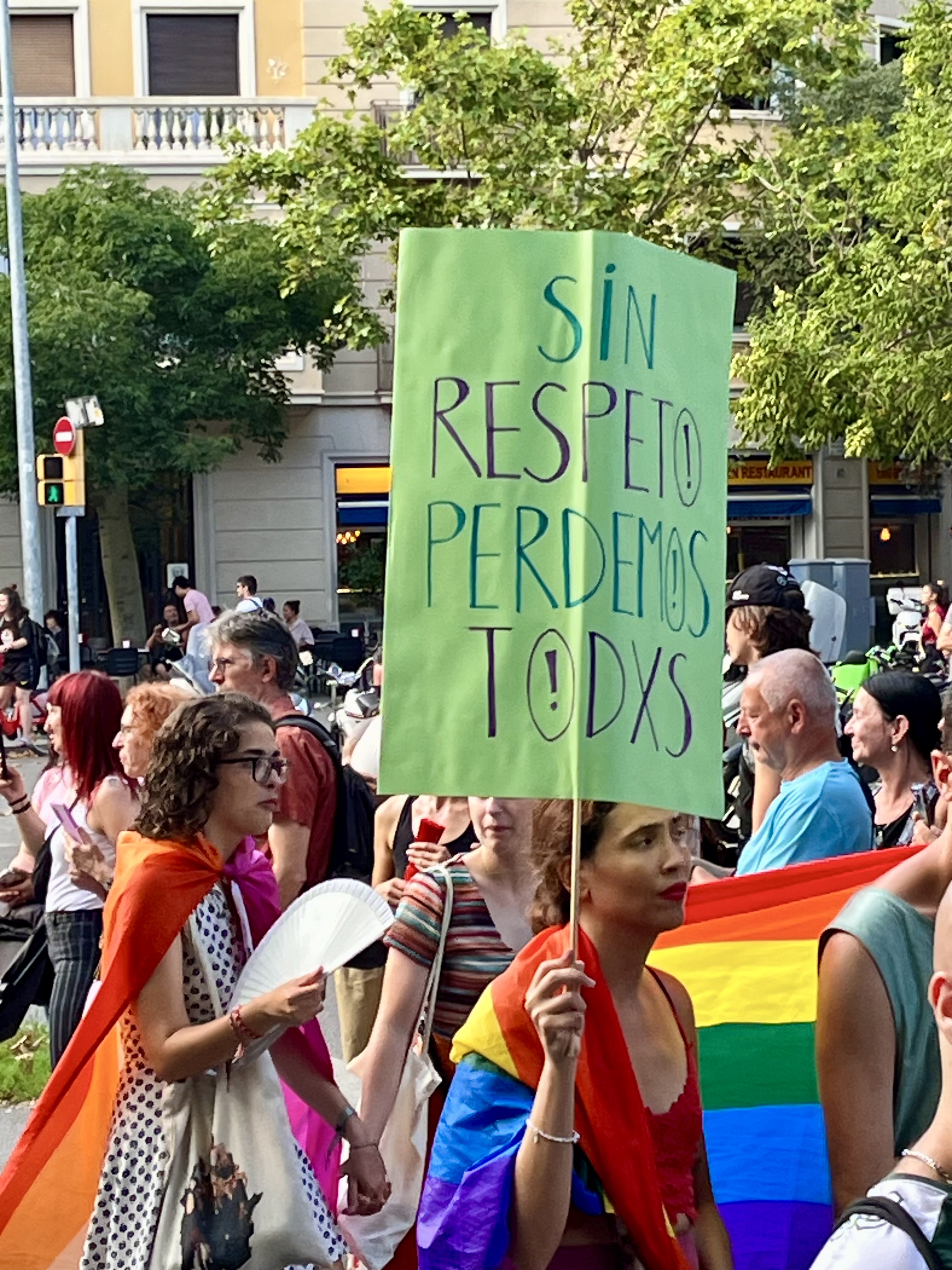 A sign reading ‘Without respect, we lose everything’ at Barcelona Pride 2025