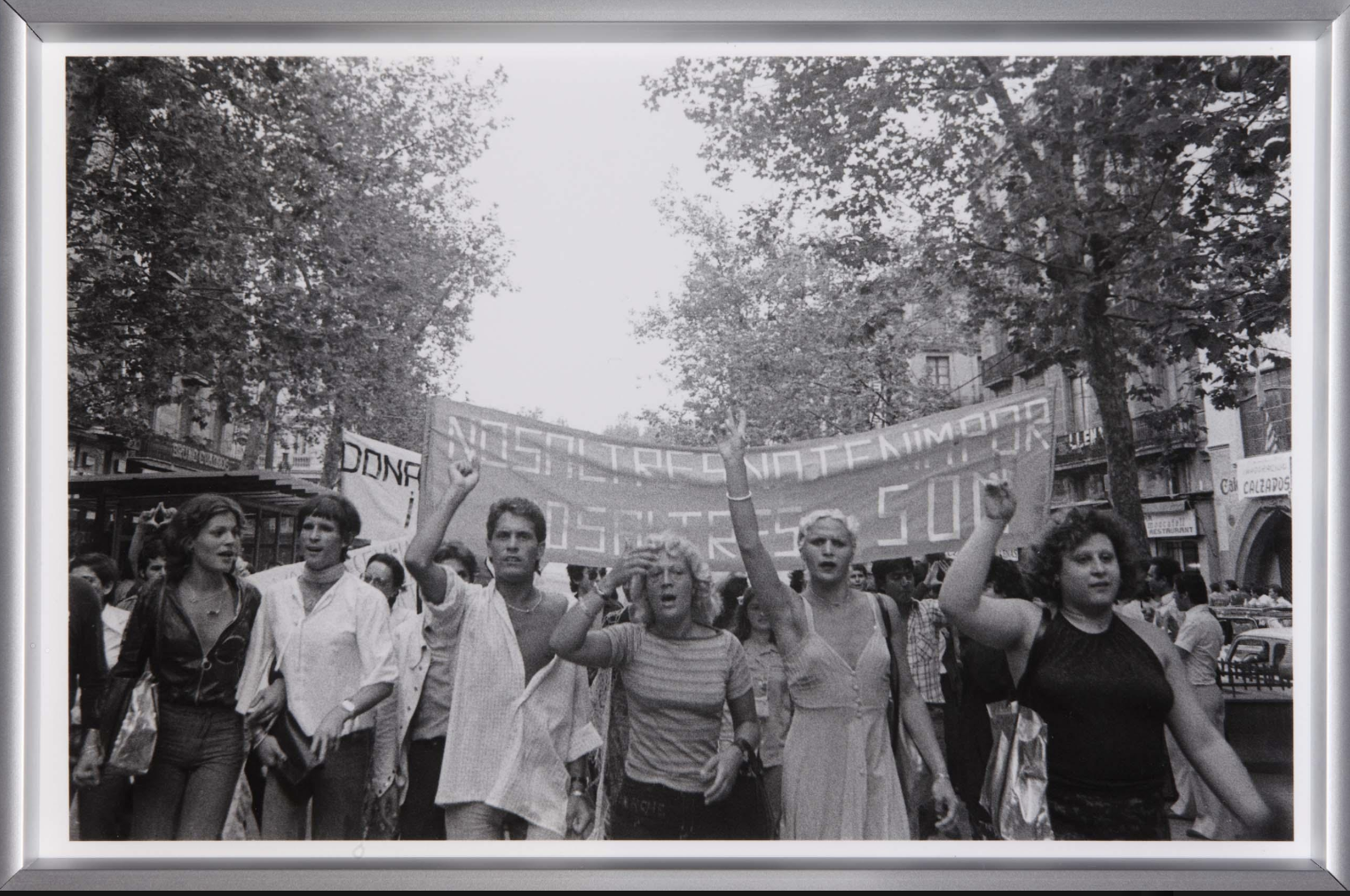 Historic photo of the first LGBTQ+ rights demonstration in Spain, Barcelona, 1977, by Colita
